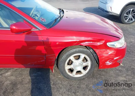 2002 Toyota Camry Solara Sle V6 z USA, uszkodzony, nr VIN 2T1CF22PX2C600437